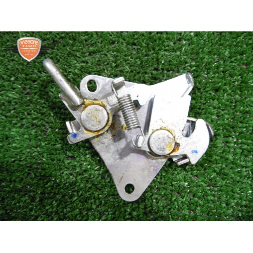 Apertura del desbloqueo del sillín Honda CBR 125 R 2004 2006